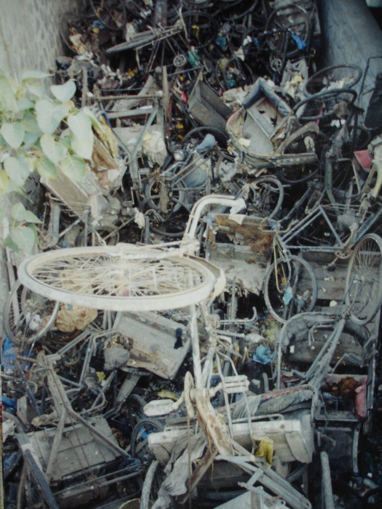 Abandoned rickshaws and bicycles at Selda Station, Kolkata